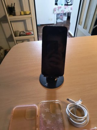 vendo ihpone 12 negro de 128 gb y 8 ram