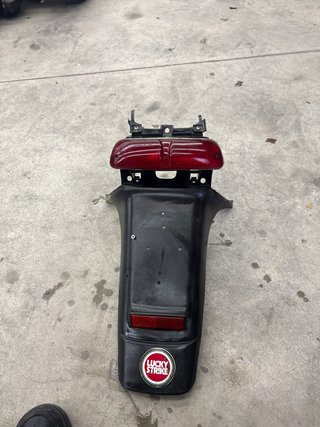 Portamatrículas Piaggio 49cc con luz