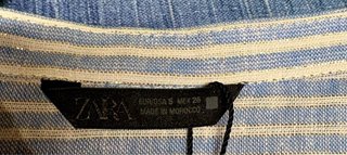 Blusa de rayas azules con volantes - Zara Talla S