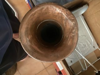 Antigua trompeta de caza de cobre