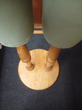 Maniquí de costura verde