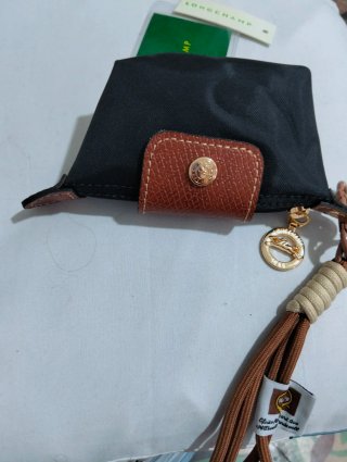 Monedero le pliage Longchamp.