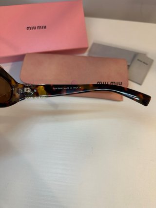 Occhiali da sole Miu Miu Tartaruga Oro