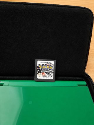 Nintendo DSi XL Verde + Pokémon Platino + 9 Juegos