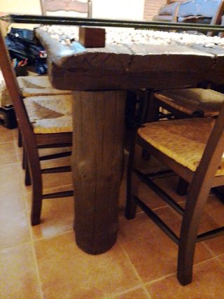 Mesa de cristal y 6 sillas de madera