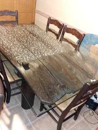 Mesa de cristal y 6 sillas de madera