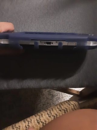 PSP Negra con funda azul