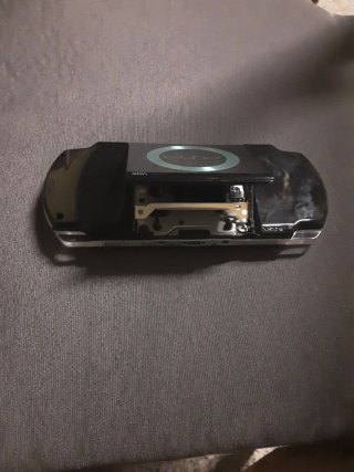 PSP Negra con funda azul