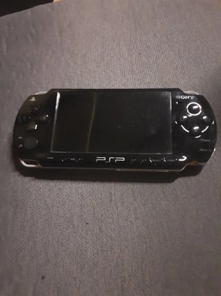 PSP Negra con funda azul