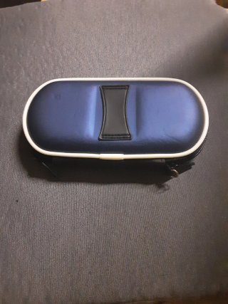 PSP Negra con funda azul