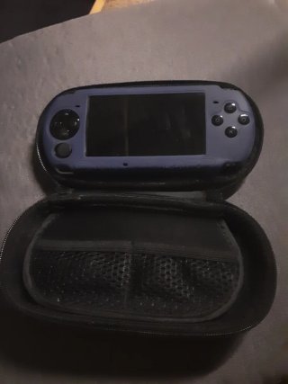 PSP Negra con funda azul