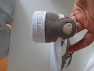 Zapatillas Puma grises y blancas