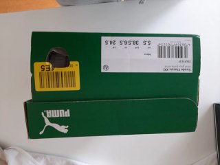 Zapatillas Puma grises y blancas