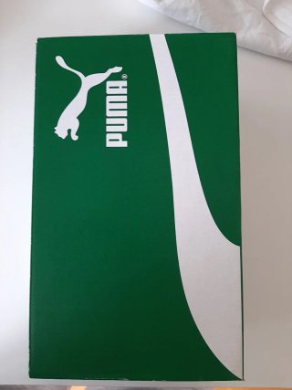 Zapatillas Puma grises y blancas