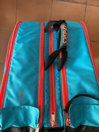 Paletero ASICS azul y naranja
