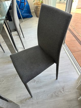Mesa de comedor de cristal y 6 sillas
