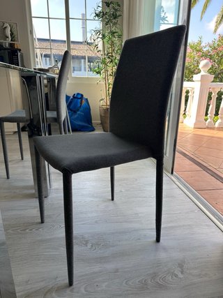 Mesa de comedor de cristal y 6 sillas