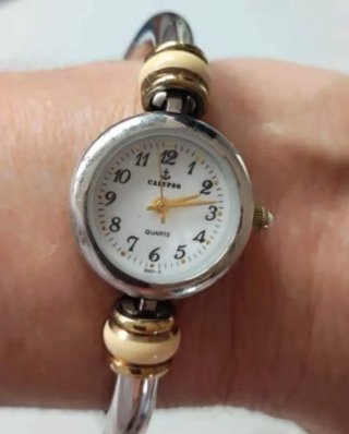 Reloj Calipso y 5 Pins Getxo