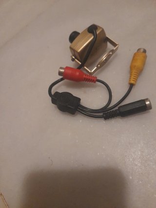 Mini Cámara Vigilancia CCTV Dorada