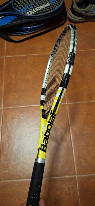 Raqueta de tenis para reparar