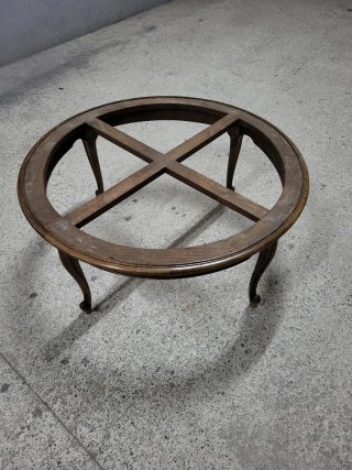 Mesa baja redonda de marmol y madera