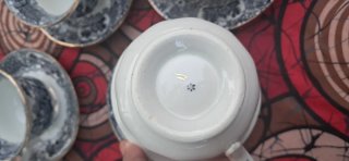 Juego de tazas y platillos de la cartuja de sevill