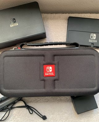 Nintendo Switch OLED completa + Estuche Oficial.