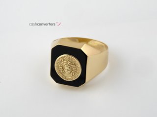 sello oro 18k con piedra con onix