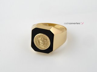 sello oro 18k con piedra con onix