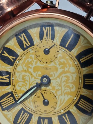 Sveglia con orologio Insa in rame antico