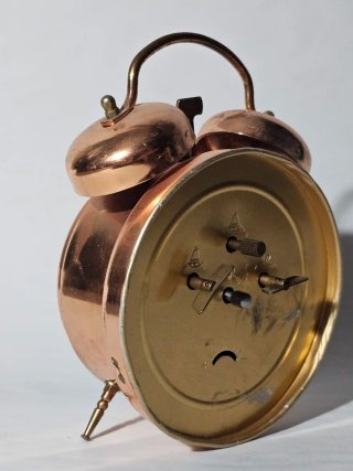 Sveglia con orologio Insa in rame antico