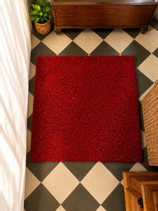 Alfombra roja de tela