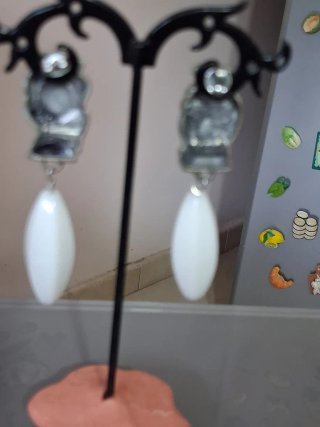 Orecchini testa donna argento bianco