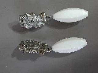 Orecchini testa donna argento bianco