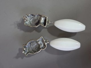 Orecchini testa donna argento bianco
