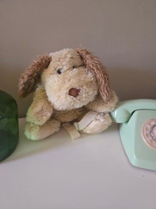 Mochila peluche perro beige y marrón