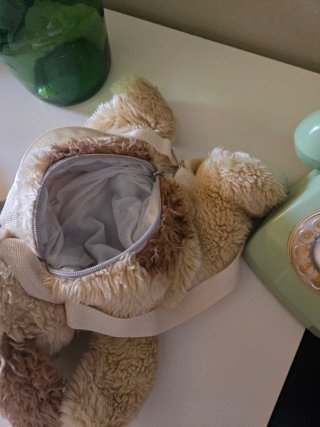Mochila peluche perro beige y marrón