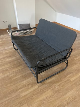 Sofá cama gris y negro