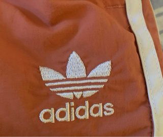 Pantalón corto Adidas naranja