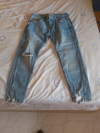 Pantalones vaqueros desgastados