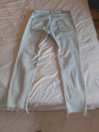 Pantalones vaqueros desgastados