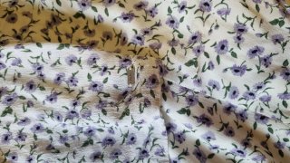 Conjunto floral morado y blanco