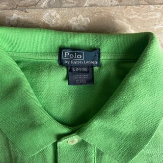 Polo verde con logo cavallino arancione 14-16y