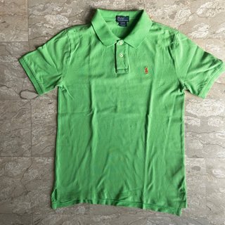 Polo verde con logo cavallino arancione 14-16y