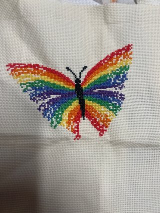 Tapiz mariposa arcoíris punto de cruz