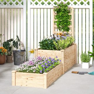 Jardinera de madera con flores y plantas