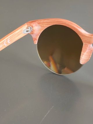 Occhiali da sole rotondi effetto legno