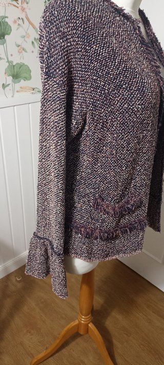 Chaqueta tweed con flecos
