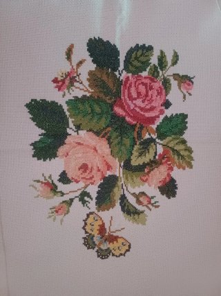 Pareja de flores a punto de cruz