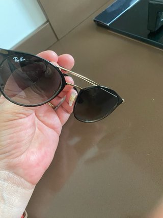 Gafas Ray-Ban doradas y azules